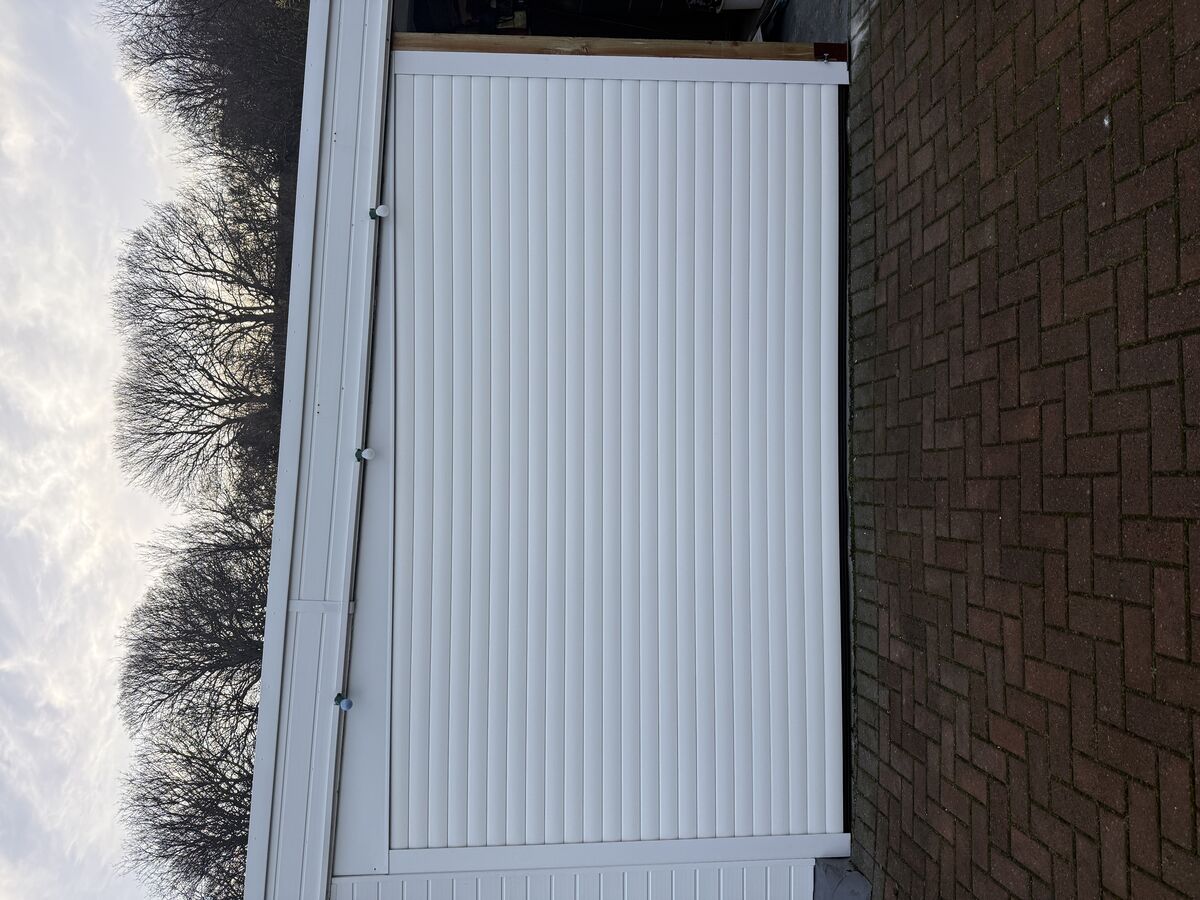 Industrial door repair and maintenance work in North Wales